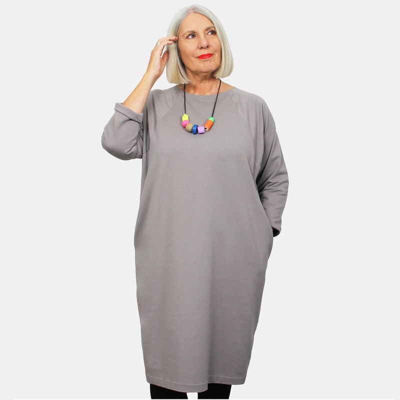 Fiona modelling the Poppy coccoon dress in a soft plain grey jersey fabric